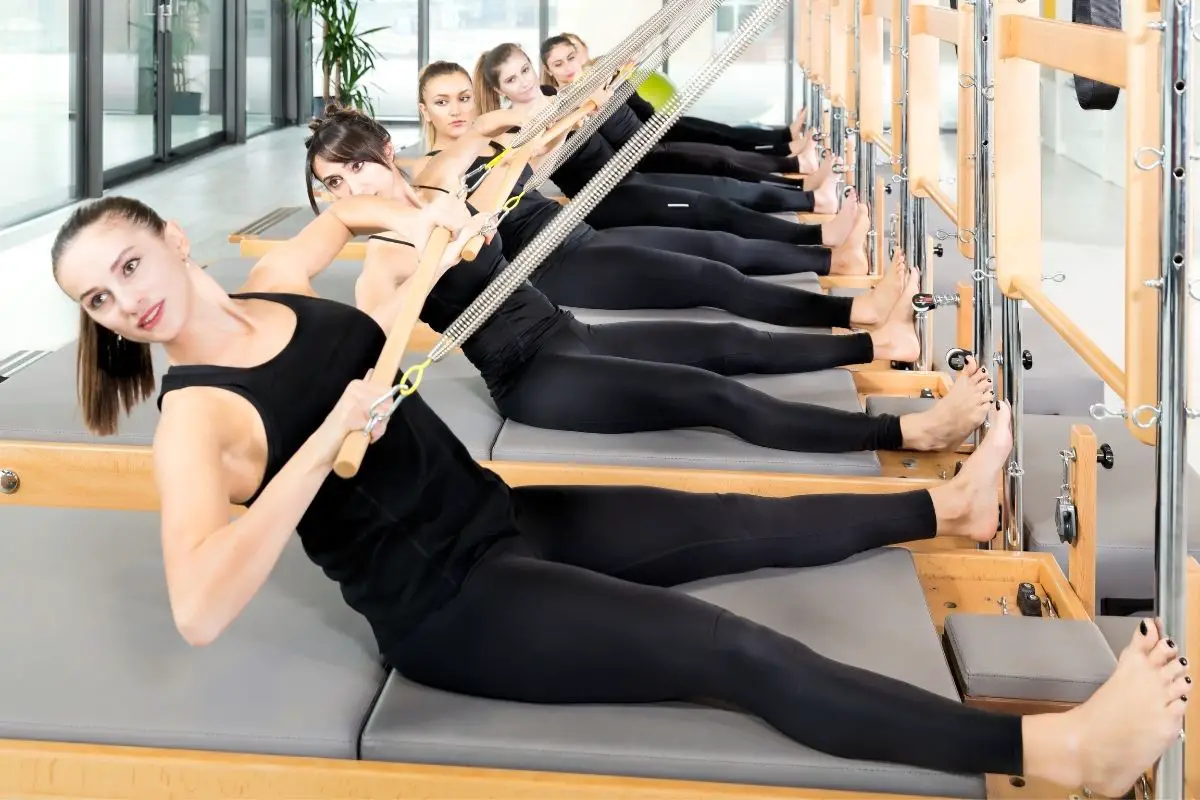 https://www.pilatesdigest.com/wp-content/uploads/2022/07/Do-You-Wear-Shoes-For-Pilates-2.jpg